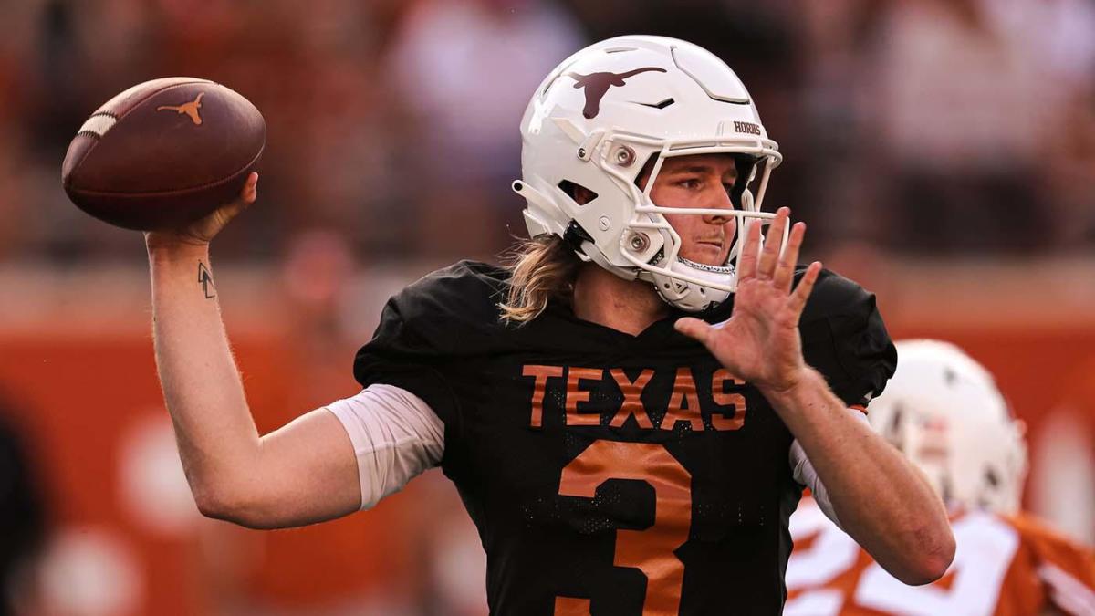 Texas quarterback Quinn Ewers throws a football.