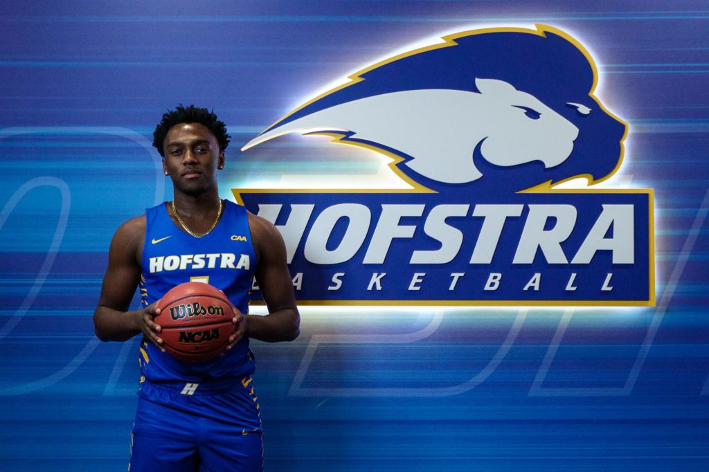 Hofstra basketball guard Tyler Thomas and head coach Speedy Claxton.